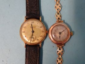 Buren, a 9ct-gold-cased "Grand Prix" gent's wrist watch with Arabic numerals, two-tone dial and
