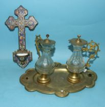 A 20th century Continental enamel metal cross and font, 23.5 x 12cm and a pair of glass jugs with