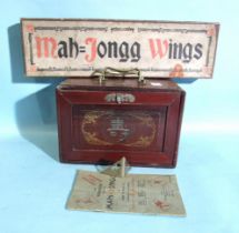 A bone and bamboo Mah Jong set in metal-mounted wooden box, with separately-boxed wings.