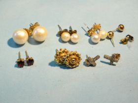 A pair of large cultured pearl ear studs, 11mm diameter on 9ct gold post fittings and six other