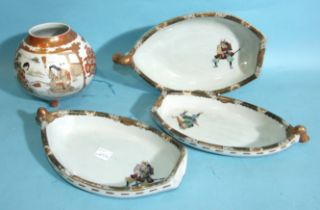 Three 19th century Japanese Kutani boat-shaped dishes decorated with samurai and a similarly-