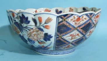 A 19th century Japanese Imari porcelain bowl decorated with flowers and insects, 24cm.