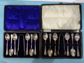 A cased set of six silver teaspoons and sugar tongs, Birmingham 1918, monogrammed, and another cased