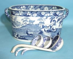 A good early-19th century transfer-printed foot bath decorated with the piping shepherd pattern,