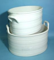 Two smaller foot baths of similar design, 47cm and 45cm wide, the larger stamped Wedgwood, the other