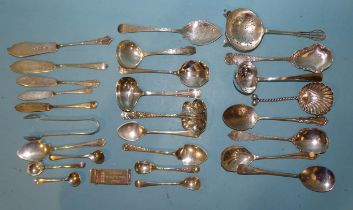 A silver sifter spoon, various jam spoons, a tea strainer and other flatware, various dates,