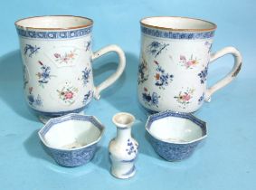 A pair of 18th century Chinese famille rose export tankards, two blue and white tea bowls and a