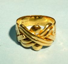 An 18ct yellow gold 'puzzle'-style ring, size T½, 10.7g.