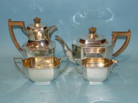 A George V four-piece silver tea service of octagonal form, comprising teapot, hot water jug,