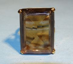 A large smoky quartz set 9ct gold ring, the stone approx 24.5 x 17.5 x 9mm, size P½, 12g.