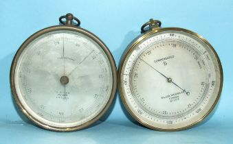 A gilt-brass compensated aneroid barometer, with hanging loop, rotating bezel with pointer and