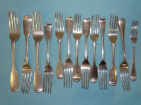 A collection of Victorian silver table and other forks, various dates and makers, ___21oz.