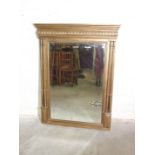 A gilt-painted over-mantel mirror, the rectangular bevelled plate beneath a moulded cornice,