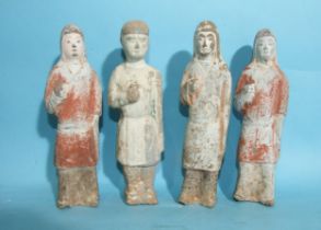 A group of four earthenware Chinese tomb figures of warriors, with painted decoration, c500A.D., (TL