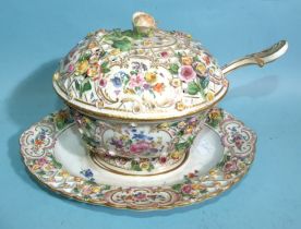 A 19th century Meissen porcelain sauce tureen, cover, stand and ladle, decorated with encrusted