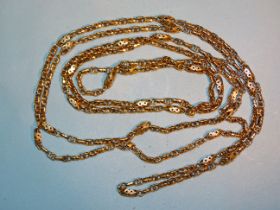 A Victorian unmarked guard chain of figure of eight and pierced links, 161cm long, 32.2g.