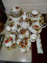 Sixty-six pieces of Royal Albert Old Country Roses  tea, coffee and dinner ware, a Losol Ware