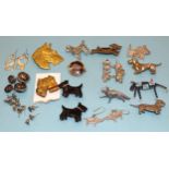 A quantity of vintage and modern brooches and earrings, etc, mainly in the form of dogs, including a