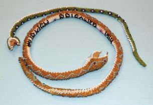 A Turkish Prisoner of War beaded snake dated 1914?, 67cm long and an unmarked smaller beaded