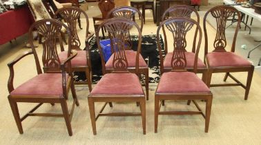 Seven reproduction Hepplewhite-style dining chairs, together with a Regency-style twin-pillar dining