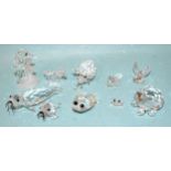 Swarovski, a collection of ten small animal figures, including seahorse, frog-prince, pig (tail