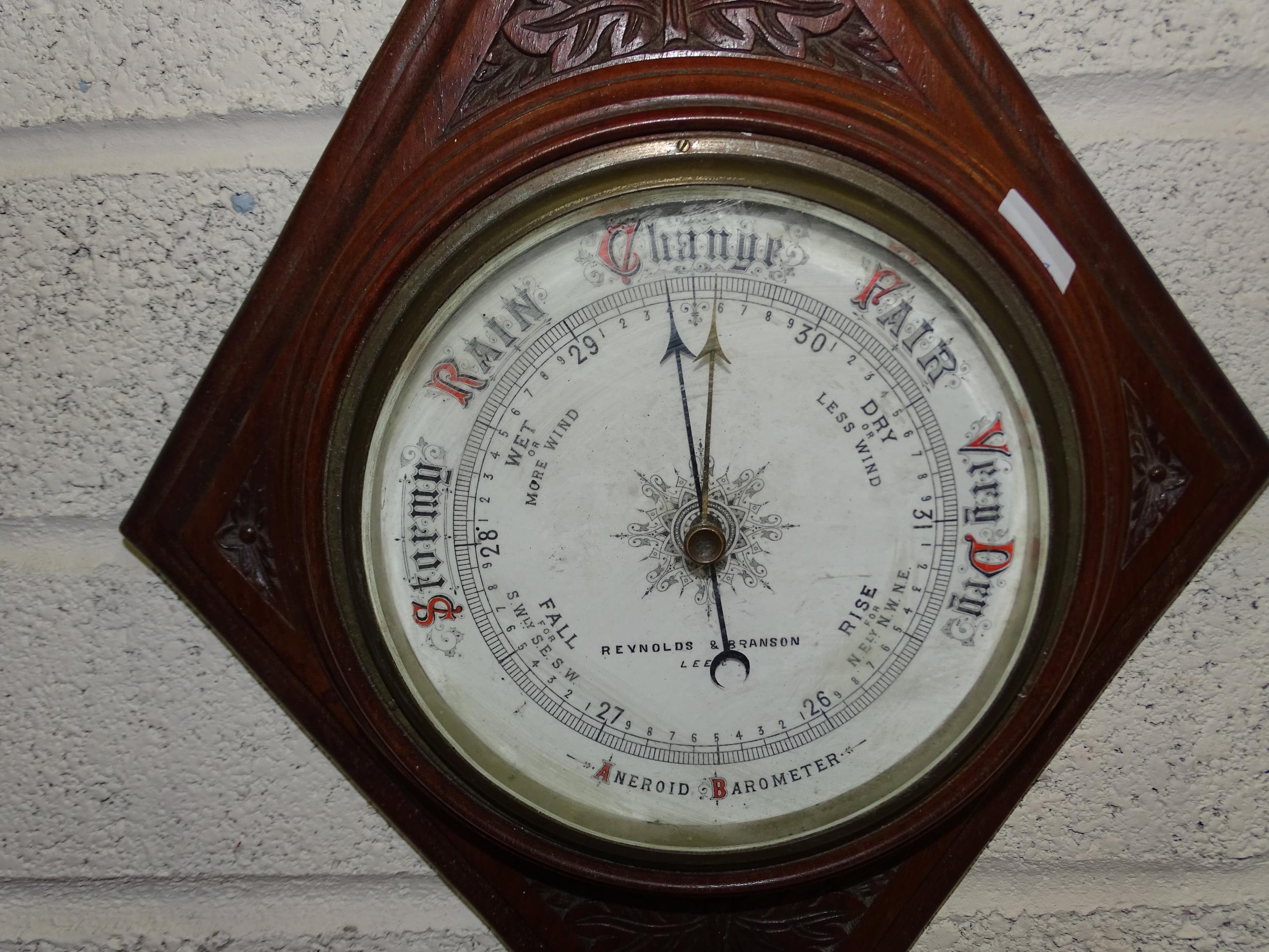 Reynolds & Branson, Leeds, a mahogany framed circular aneroid barometer on diamond-shape plaque - Image 2 of 2