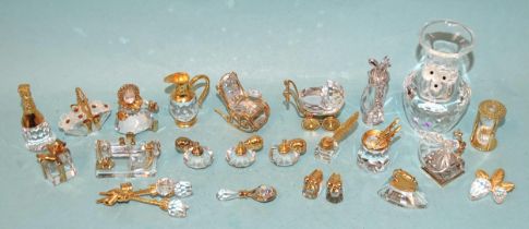 A collection of various boxed and unboxed Swarovski crystal 'Memories', including 'gramophone', '