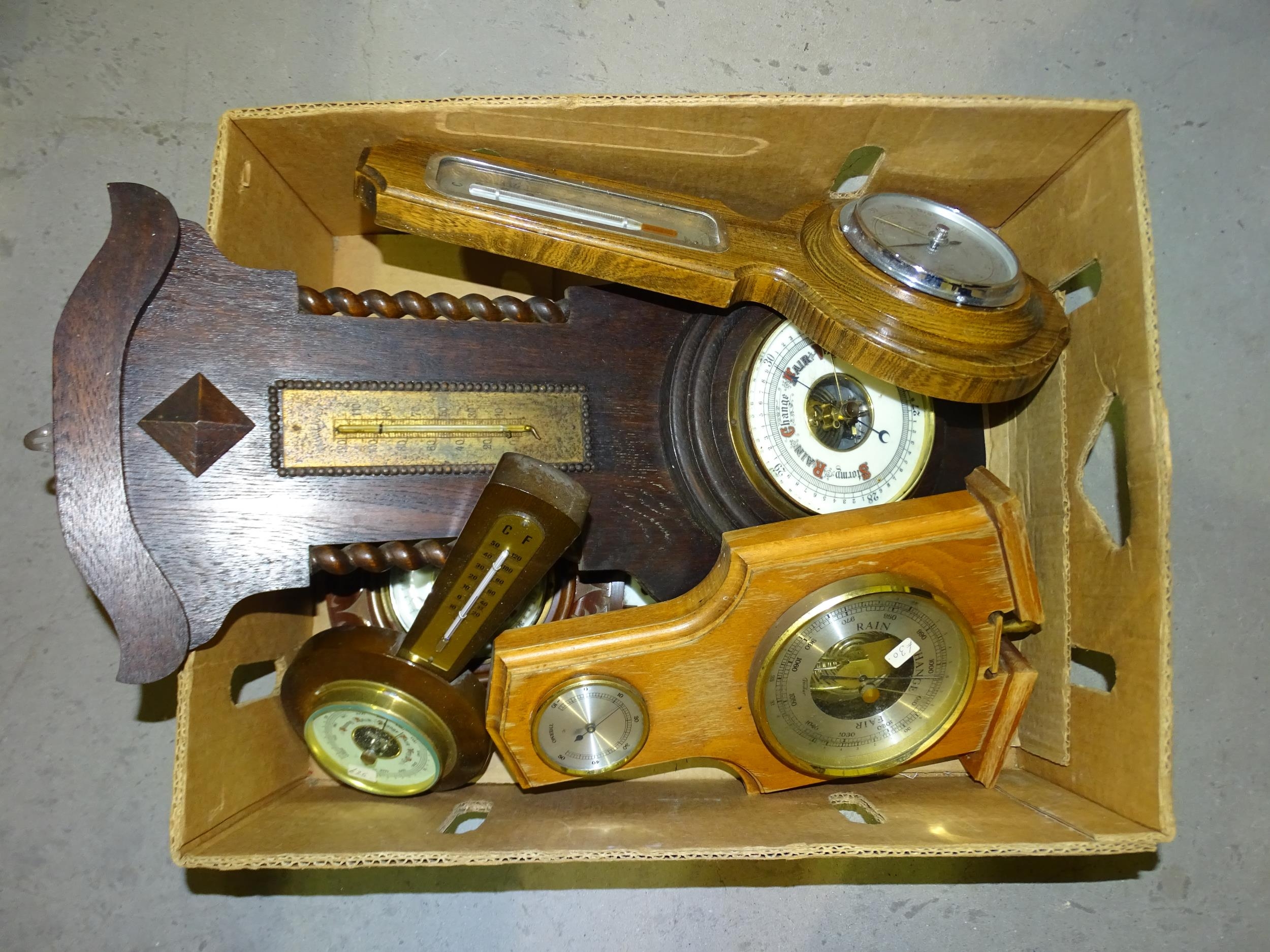 A collection of 20th century aneroid barometers, some damaged. - Image 2 of 2