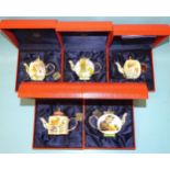 A collection of five Charlotte di Vita Trade Plus Aid Beatrix Potter themed enamel teapots, (all