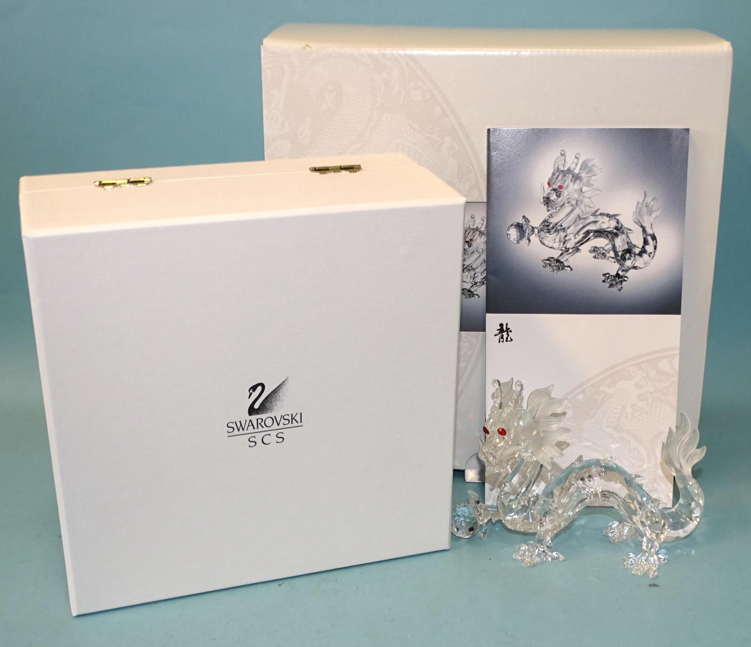 Swarovski, a set of three Fabulous Creatures crystal sculptures: The Unicorn-1996, The Dragon-1997,