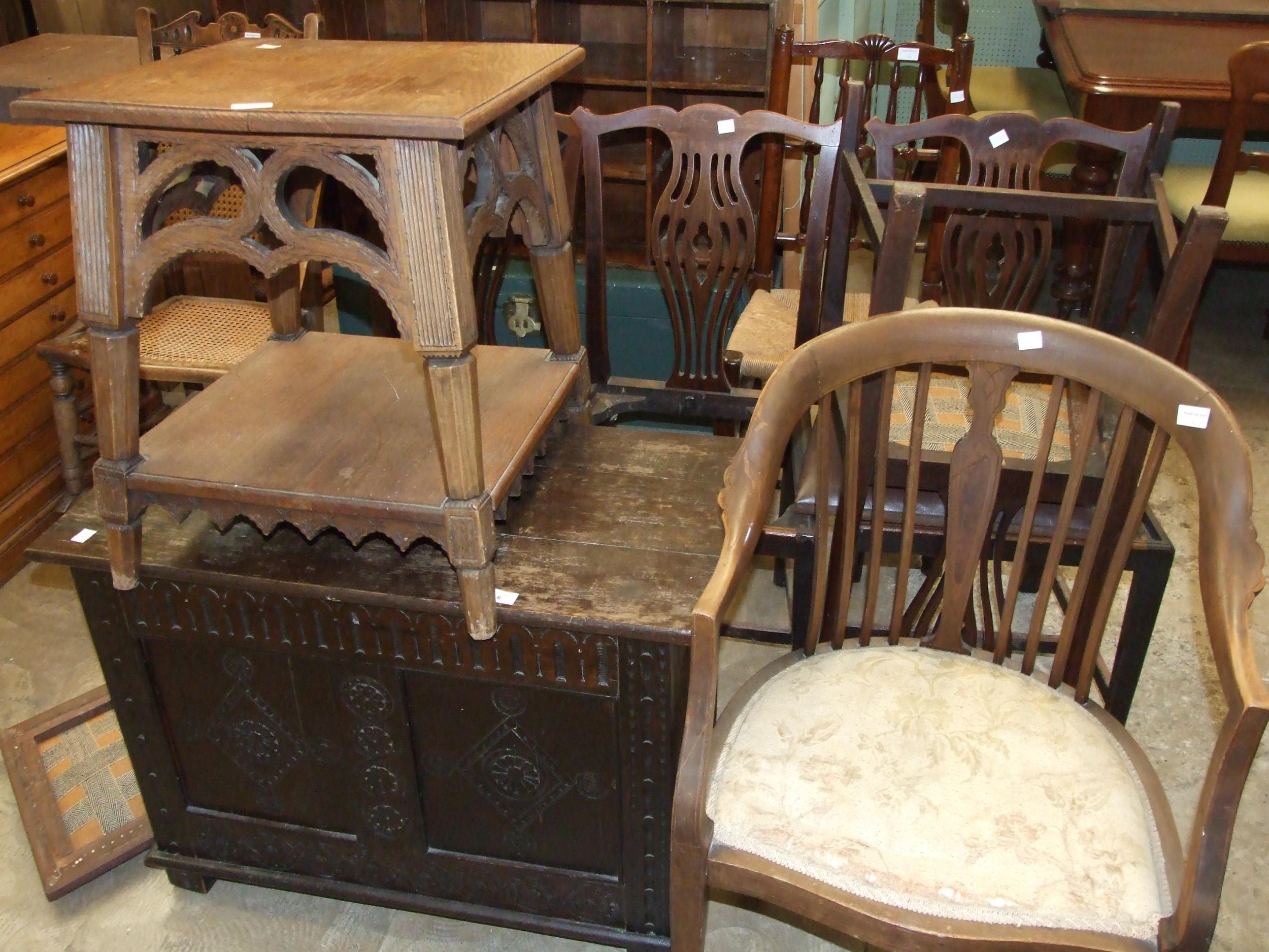 A carved oak coffer, four Georgian-style dining chairs labelled J Hunter & Co, Manchester, other