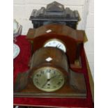 A mahogany cased mantel clock with Japy Frères movement striking on a gong, the enamel dial