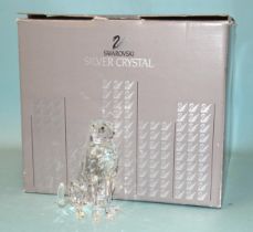 Swarovski, three crystal sculptures: Seated Cheetah, Lion and Standing Tiger, all in fitted boxes