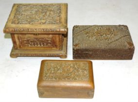 A 20th century Chinese carved wood box, with deeply-carved relief panels, 20 x 14.5cm and two