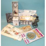 A collection of modern Beatrix Potter memorabilia, including lapel badge, Royal Mint three Peter