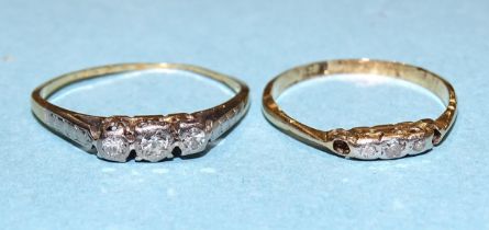 Two 18ct gold rings, each set three 8/8-cut diamonds, (both a/f), sizes L and M, 2.7g.
