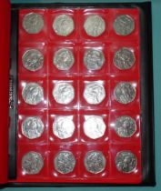 Three Schultz albums of Beatrix Potter character 50p coins 2016-2018, approximately 460 coins.