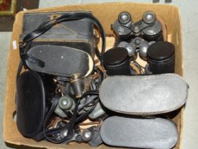 A pair of 8x40 field 8.3° waterproof binoculars, a pair of Bresser Saturn 20x60OVR binoculars and