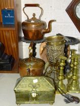 A brass casket, 23cm wide, two copper kettles, two pairs of brass candlesticks and other metalware.