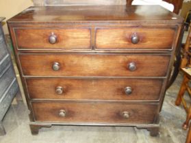 A Georgian mahogany chest of two short and three long cockbeaded drawers, on bracket feet, 111cm