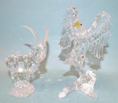 Two Swarovski crystal sculptures: 'Bald Eagle' and 'Ibex', both in fitted boxes with outer