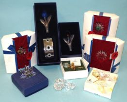 Swarovski, a collection of various crystal flower ornaments and a collection of various Swarovski