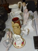 A collection of three Lladro angel/cherub figures, a Jones & Walley 'Gypsy' jug, 14.5cm high and