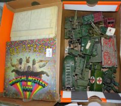 A collection of play-worn Dinky and other toys, mainly military.