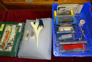 A collection of Concorde souvenir items, three Bucks lace bobbins, various diecast toys and