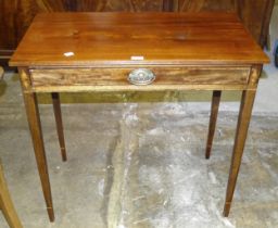 A mahogany rectangular hall table fitted with a frieze drawer, a circular tilt-top table, (cut-