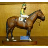 A Beswick figure of 'Nijinsky - Lester Piggott Up', on wooden base, 32cm high, (reins a/f).