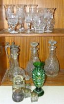 A collection of cut-glass Champagne flutes, a pair of hobnail-cut decanters, 29cm high, inkwells and