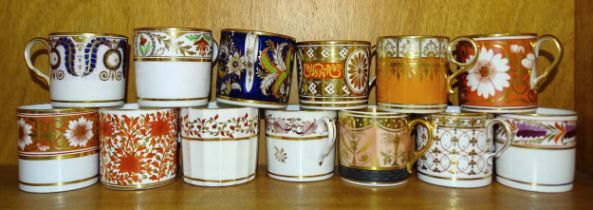 A collection of thirteen 19th century decorated coffee cans.