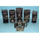 Six pocket folding cameras: Kodak 1, 1A, 3A, Zeiss Ikon, Voightländer, etc, (some a/f), three with